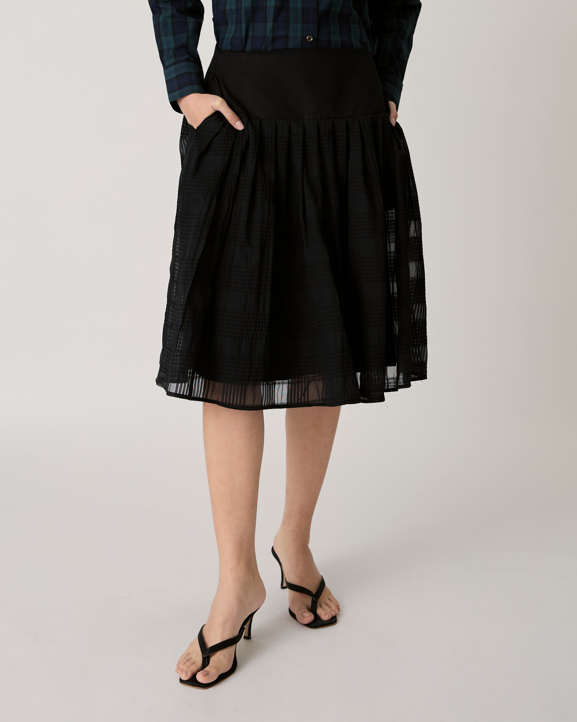 Returns to Nature - Pleated Midi Skirt in Plaid Black