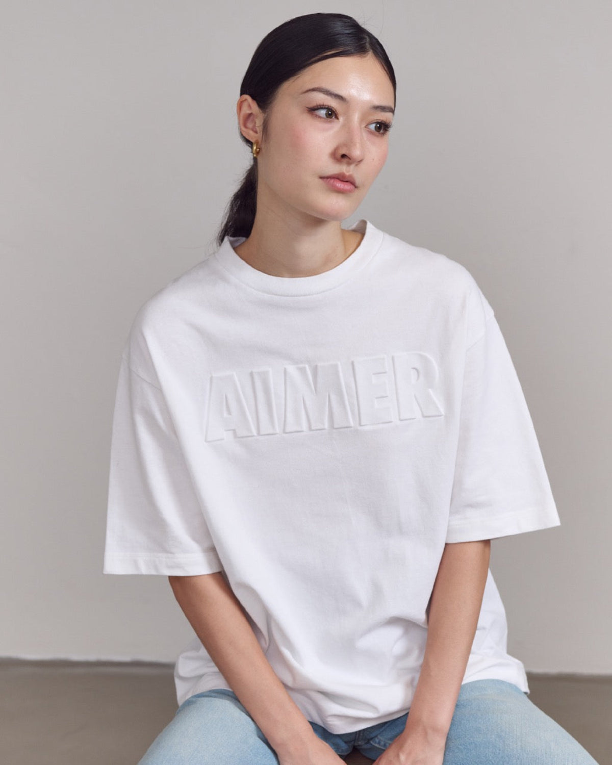 AIMER - Embossed T-Shirt in White